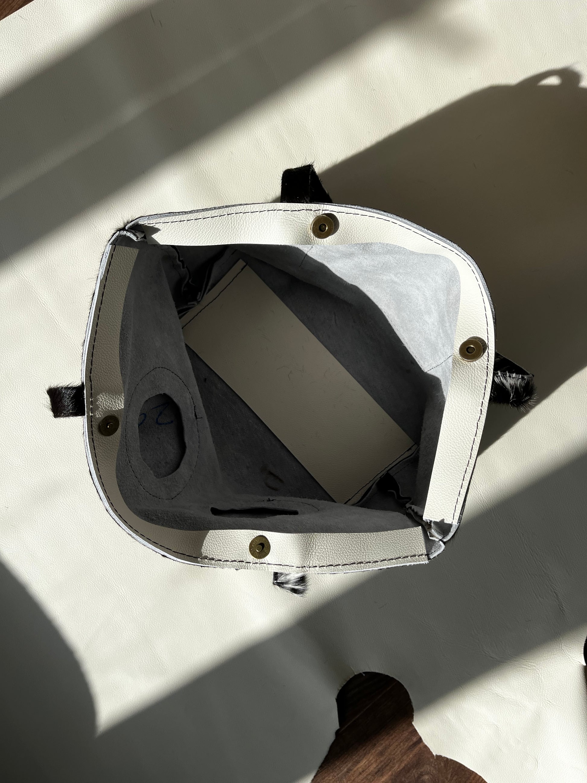 Black Cowhide Pierced Tote