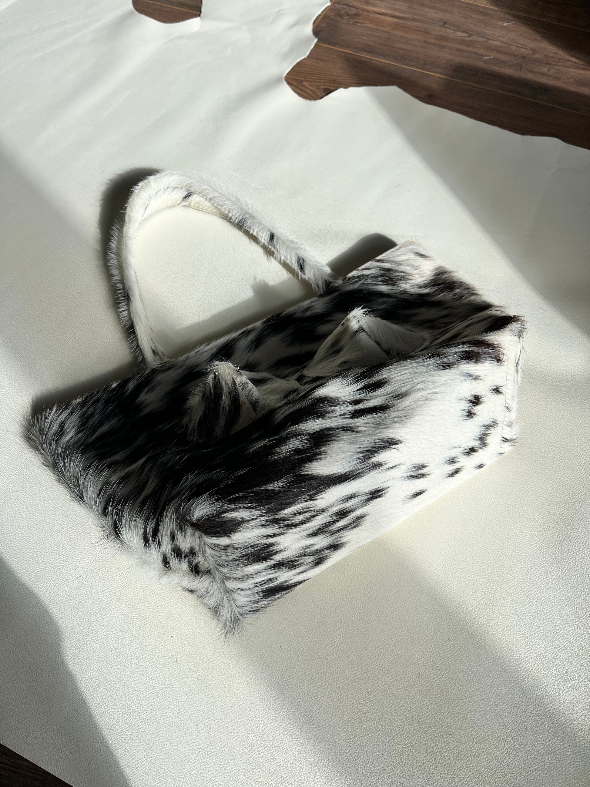 Cowhide pierced tote