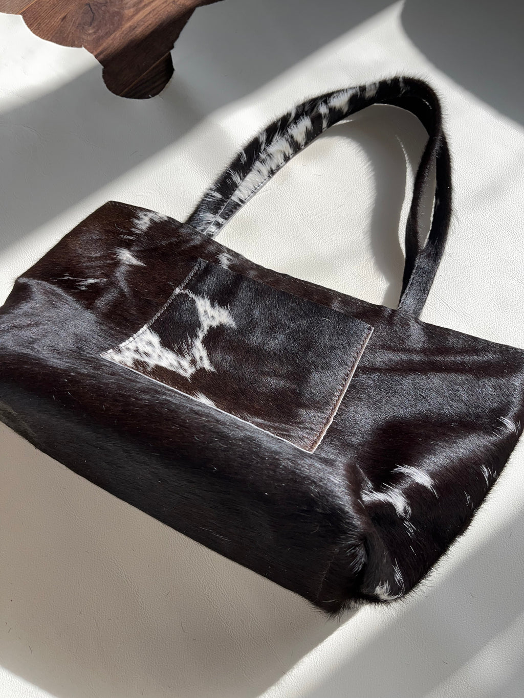 Black Cowhide Pierced Tote
