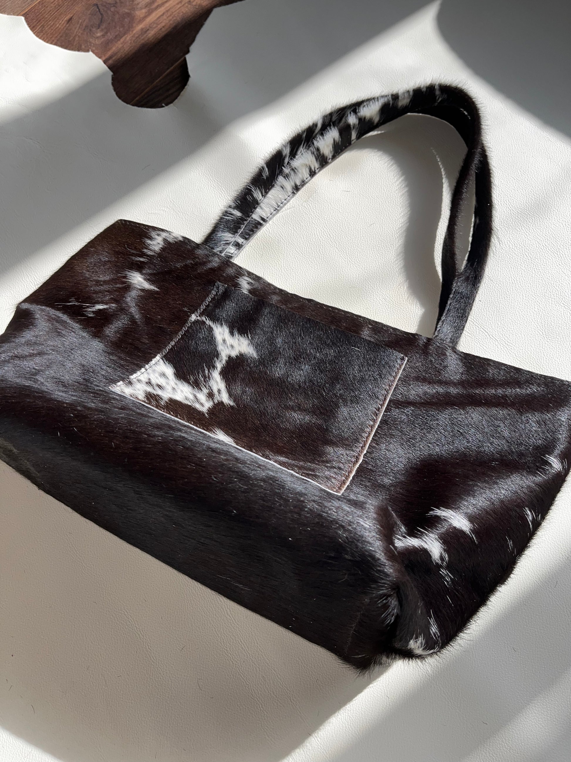 Black Cowhide Pierced Tote