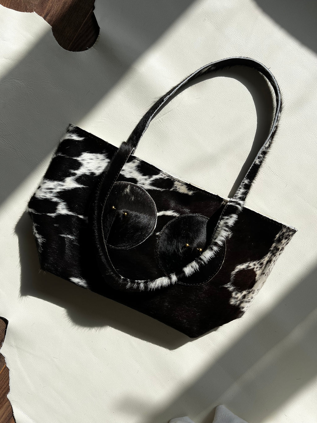 Black Cowhide Pierced Tote