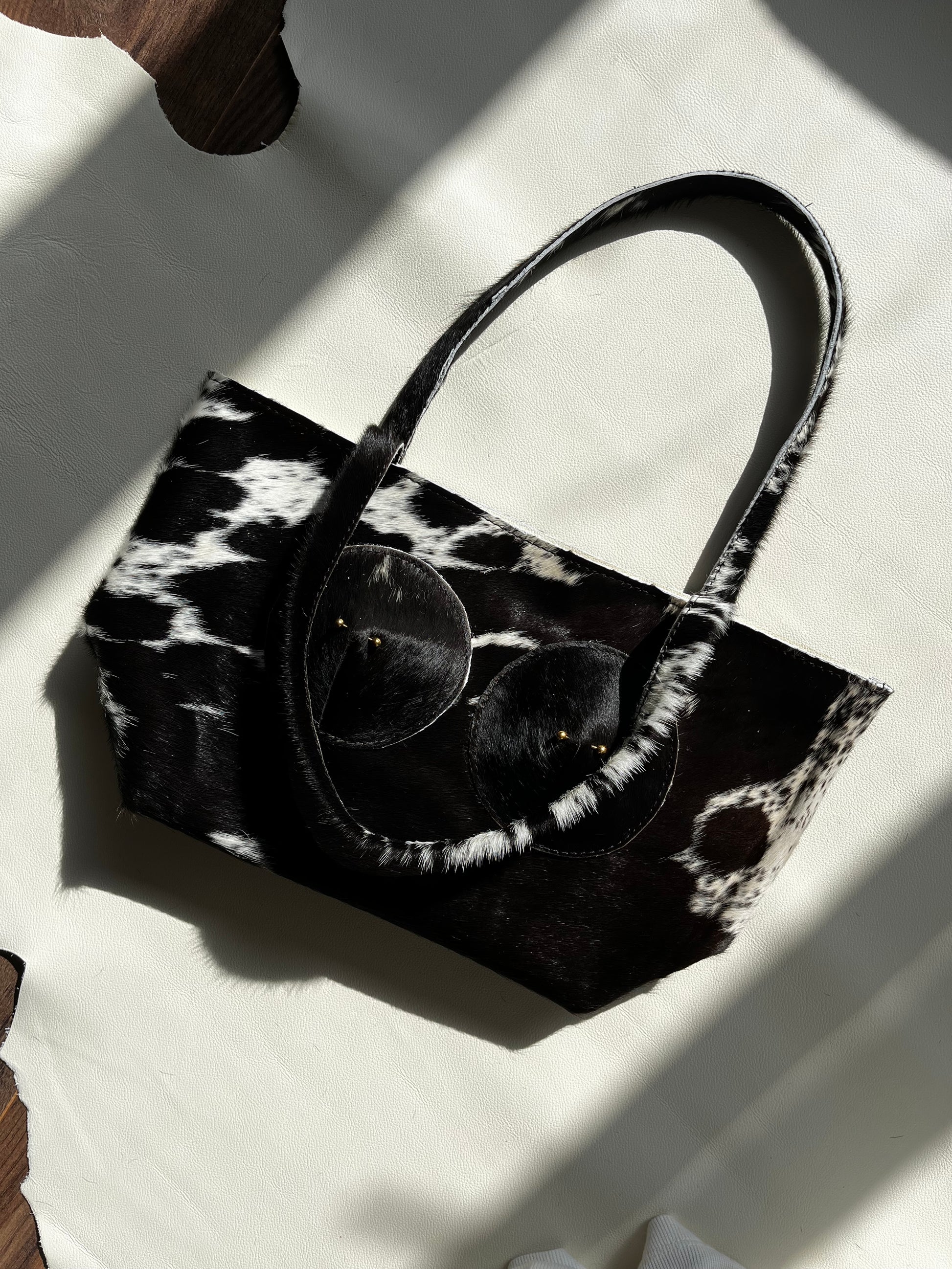 Black Cowhide Pierced Tote
