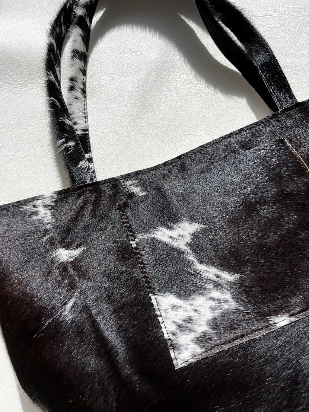 Black Cowhide Pierced Tote
