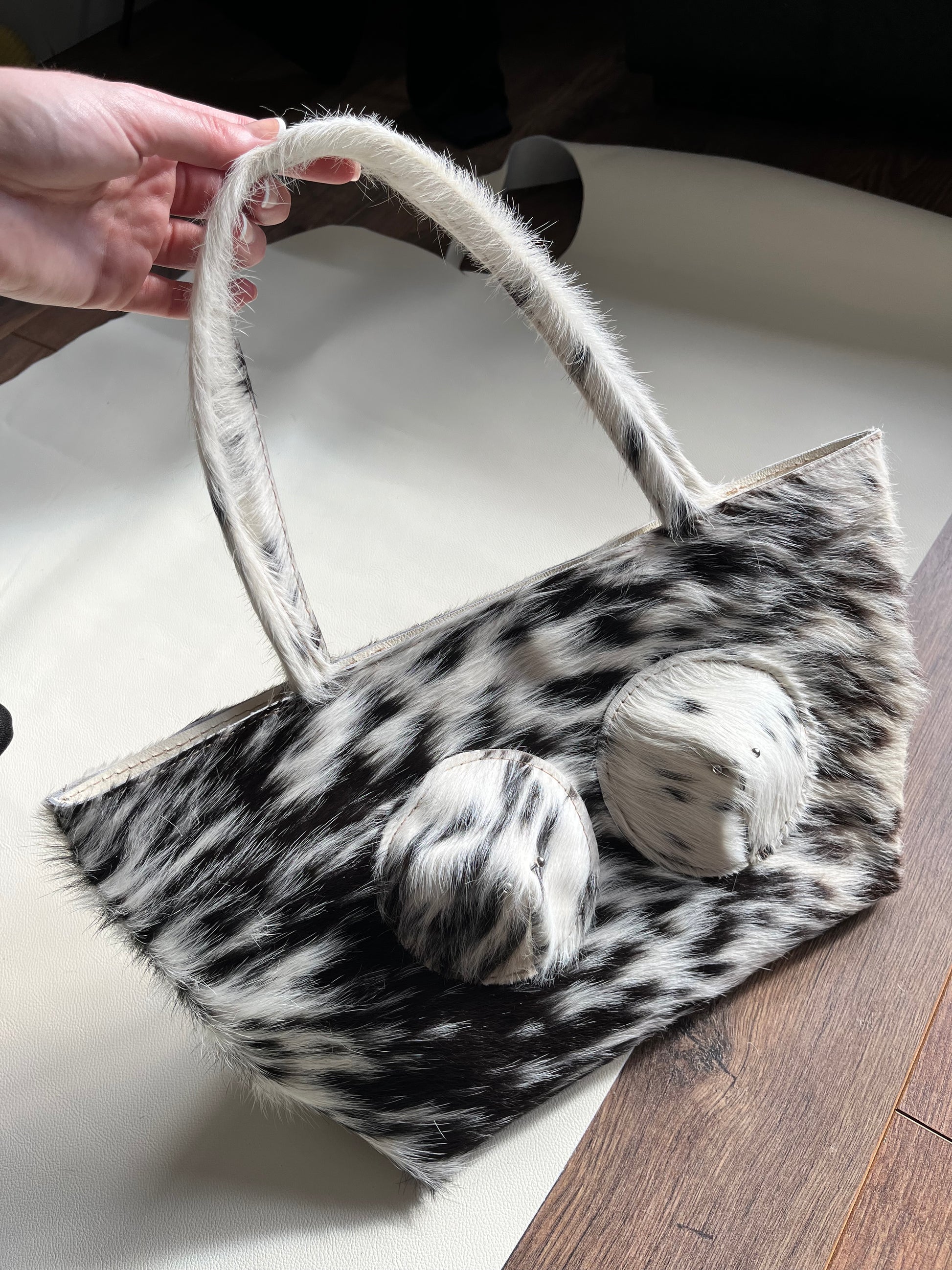Cowhide pierced tote