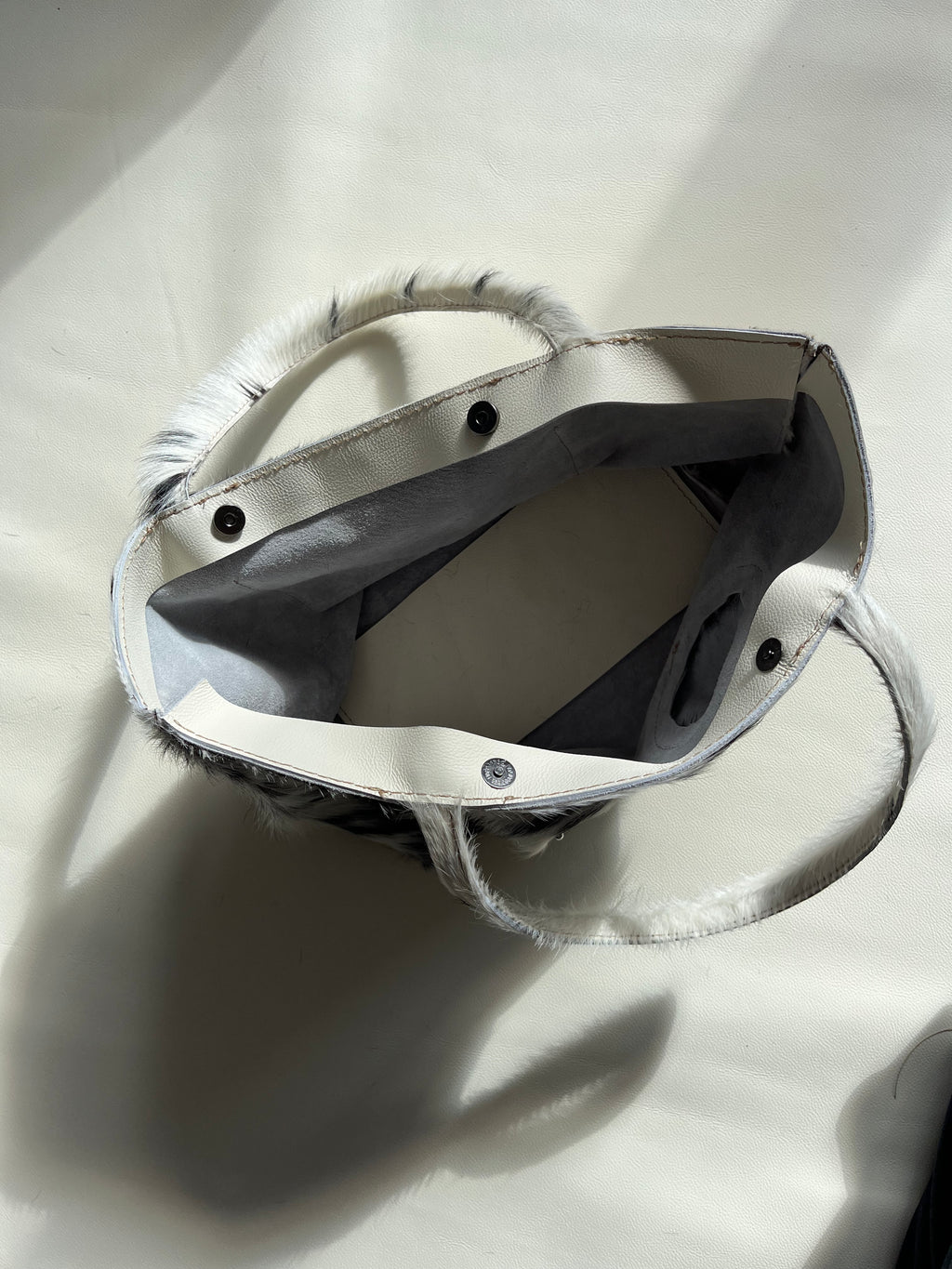 Cowhide pierced tote