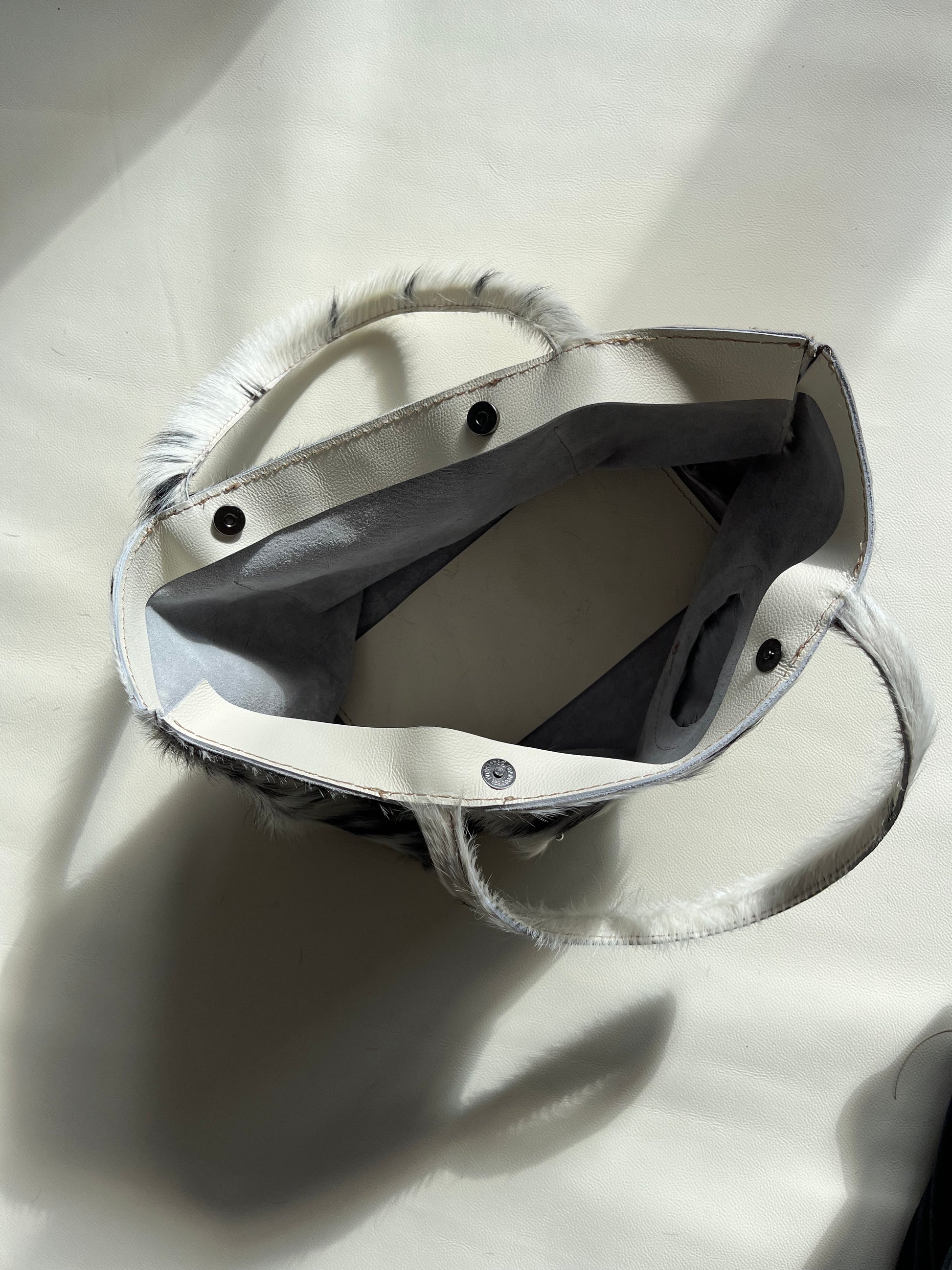 Cowhide pierced tote