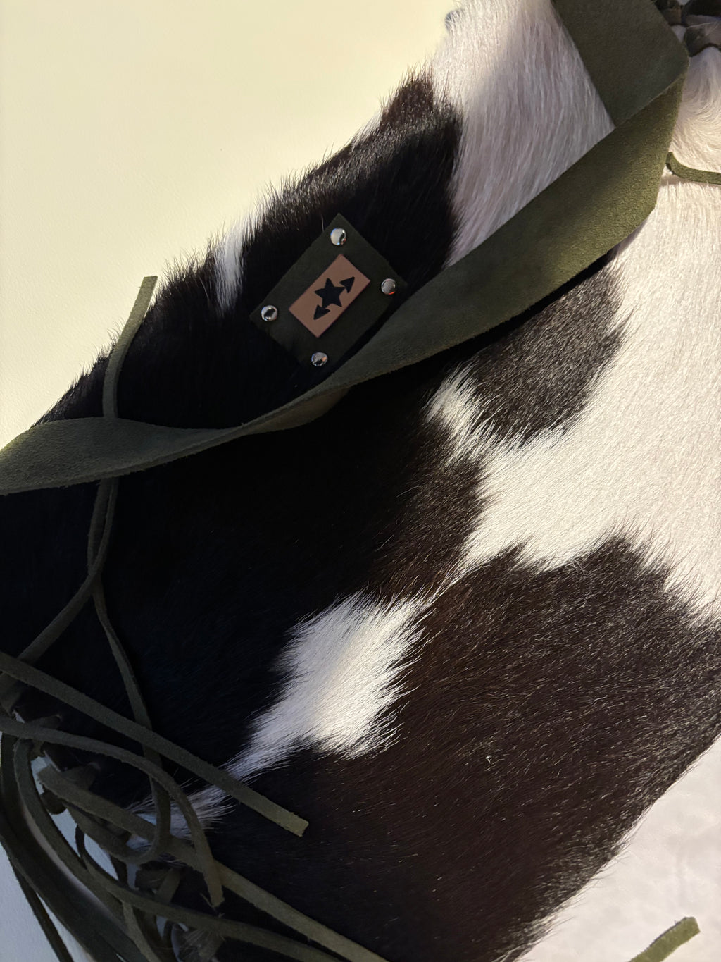 Tassel cowhide carry-all